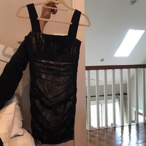 black dress and in the middle tan